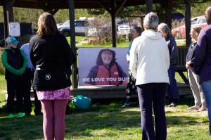 People attend a grief circle for Anesha "Duffy" Murnane on Wednseday, May 18, 2022, at WKFL Park in Homer, Alaska. A Homer man has been charged with the murder and kidnapping of Murnane, who went missing on Oct. 17, 2019. The circle was held to give people a chance to mourn and remember Murnane. 
Homer artist Mavia Muller built a basket for people to place spruce cones in as tokens of memory for Murnane. Muller said the smaller basket will be place in the next Burning Basket, to be called "Breathe."
"It feels like after years of holding our breath we can finally breathe," Muller said at the grief circle.
(Photo by Michael Armstrong/Homer News)