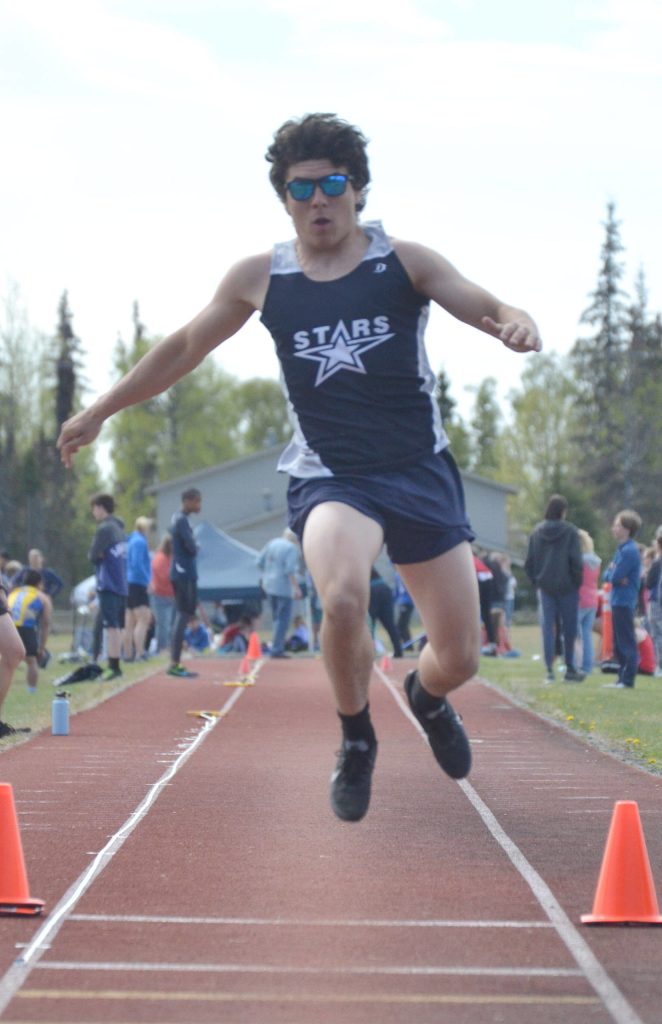 Soldotnas Isaac Chavarria competes in the triple jump at the Region 3/Division I meet at Ed Hollier Field at Kenai Central High School in Kenai, Alaska, on Saturday, May 21, 2022. (Photo by Jeff Helminiak/Peninsula Clarion)