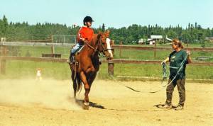 Photo by Clark Fair
Abby (Lancashire) Ala, seen here giving riding lessons in the early 2000s, was just a child when her mother befriended Miriam Mathers. Ala now lives on a portion of the old Mathers homestead.