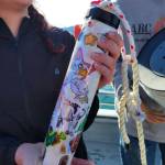 Members of Homer Flex School's Marine Biology class on April 21, 2022, prepare to deploy a CTD, or conductivity, temperature, and depth, device in Kachemak Bay, Alaska. (Photo provided, Center for Alaskan Coastal Studies)