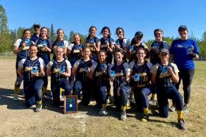 The Homer Mariners softball team poses after winning the region championship for the fifth year in a show. (Photo by Monica Anderson)