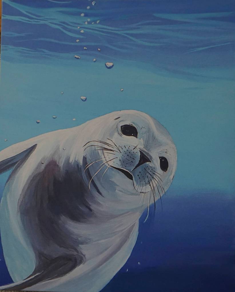 This print of Sealin Around was made from a painting Tarryn Zebrinos donated to the Alaska SeaLife Center. (Photo by Michael Armstrong/Homer News)