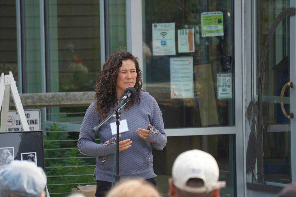 Tela ODonnell Bacher, a childhood friend of Anesha Duffy Murnane, speaks at a memorial for Murnane and the dedication of the Loved & Lost Memorial Bench on Sunday, June 12, 2022, at the Homer Public Library in Homer, Alaska. (Photo by Michael Armstrong/Homer News)