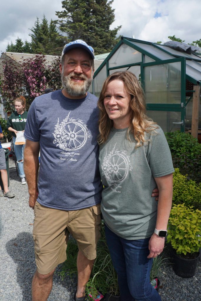Steven and Stacey Veldstra pose for a photo at the 50th anniversary celebration of Wagon Wheel Garden & Pet on Friday, June 10, 2022, in Homer, Alaska. (Photo by Michael Armstrong/Homer News)