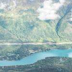 An area cleared to make way for the Cooper Landing Bypass project can be seen above the intersection of the Kenai River and Kenai Lake in Cooper Landing, Alaska, on Sept. 6, 2021. (Photo by Jeff Helminiak/Peninsula Clarion)