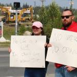 Megan Mitchell (left) and Nick McCoy (right) protest the U.S. Supreme Courts overturning of Roe v. Wade at the intersection of the Kenai Spur and Sterling highways on Friday, June 24, 2022 in Soldotna, Alaska. (Ashlyn OHara/Peninsula Clarion)
