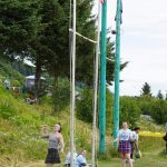 Norma jean Farr makes a successful throw in the weight-for-height event at the Kachemak Bay Highland Games on Saturday, July 2, 2022, at Karen Hornaday Park in Homer, Alaska. (Photo by Michael Armstrong)
