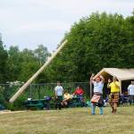 Chris Carr throws the caber at the Kachemak Bay Highland Games on Saturday, July 2, 2022, at Karen Hornaday Park in Homer, Alaska. (Photo by Michael Armstrong)