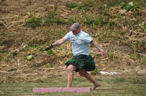 Dave Hancock throws in the weight-for-distance event at the Kachemak Bay Highland Games on Saturday, July 2, 2022, at Karen Hornaday Park in Homer, Alaska. (Photo by Michael Armstrong)