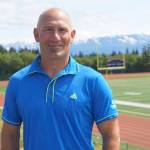 Former Homer High School Athletic Director poses on Friday, July 1, 2022, at the high school athletic field in Homer, Alaska. (Photo by Michael Armstrong/Homer News)