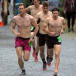 Lars Arneson and Max King race in the lead pack at the mens Mount Marathon Race on Monday, July 4, 2022, in Seward, Alaska. King won, while Arneson was third. (Photo by Jeff Helminiak/Peninsula Clarion)