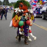 The Bouyman entertains parade goers during the Homer Fourth of July parade on Monday, July 4, 2022, on Pioneer Avenue in Homer, Alaska. (Photo by Michael Armstrong/Homer News)