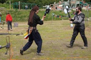 En garde!

Liam "Scrimgar" James, left, and Neill "Bogeyman" Roderick face off in a duel for Ice Fire Bay, Homer's Live Action Role Play group, on Saturday, July 2, 2022, at Karen Hornaday Park in Homer, Alaska. Ice Fire Bay has met every Saturday throughout the COVID-19 pandemic, including outdoors in the winter.
Ice Fire Bay holds a weekend of LARP Friday, July 22, through Sunday, July 24, 2022 at Karen Hornaday Park. The $45 fee includes games, a Magic: The Gathering tournament, a quest at the park, a campsite for two nights, two breakfasts and two dinners, and a banquet meal. Registration is at 3 p.m. Friday. For more information, call 907-399-3035.
(Photo by Michael Armstrong/Homer News)