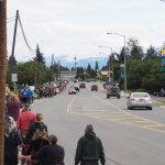 A group of about 400 people march along Pioneer Avenue for the Womens March: Bans Off Our Bodies protest on Saturday, July 9, 2022, in Homer, Alaska. The line of marchers stretched from about Main Street to Kachemak Way (Photo by Michael Armstrong/Homer News)