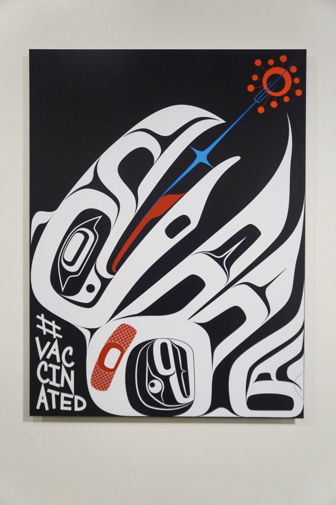 Crystal Rose Demeinetieff Worls digital illustrations on aluminum, Haa Shagéinyaa: Our Protecting Power, are in the Protection: Adaptation and Resistance show at the Pratt Museum & Park in Homer, Alaska. The show continues through Sept. 24, 2022. (Photo by Michael Armstrong/Homer News)