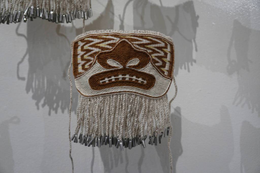 One of the Chilkat protector masks made in a Zoom workshop led by Lily Wooshkindein Da.áat Hope of Juneau and on display in the Protection: Adaptation and Resistance show at the Pratt Museum & Park in Homer, Alaska. The show continues through Sept. 24, 2022. (Photo by Michael Armstrong/Homer News)