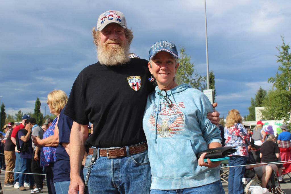 David (left) and April (right) Orth wait to enter the Alaska Airlines Center for a Save America rally on Saturday, July 9, 2022 in Anchorage, Alaska. Former President Donald Trump, U.S. Senate candidate Kelly Tshibaka and U.S. House candidate Sarah Palin were among the events speakers. (Ashlyn O���Hara/Peninsula Clarion)