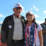 Mike (left) and Kathy (right) Medcoff wait to enter the Alaska Airlines Center for a Save America rally on Saturday, July 9, 2022 in Anchorage, Alaska. Former President Donald Trump, U.S. Senate candidate Kelly Tshibaka and U.S. House candidate Sarah Palin were among the events speakers. (Ashlyn OHara/Peninsula Clarion)