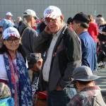 Mike (left) and Kathy (right) Medcoff wait to enter the Alaska Airlines Center for a Save America rally on Saturday, July 9, 2022 in Anchorage, Alaska. Former President Donald Trump, U.S. Senate candidate Kelly Tshibaka and U.S. House candidate Sarah Palin were among the events speakers. (Ashlyn OHara/Peninsula Clarion)