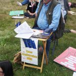 Ken Landfield staffs a voter registration table on Saturday, July 9, 2022, during the Bans off our bodies march and protest at WKFL Park in Homer, Alaska. (Photo by Michael Armstrong/Homer News)