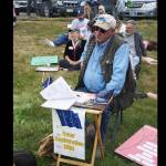 Ken Landfield staffs a voter registration table on Saturday, July 9, 2022, during the "Bans off our bodies" march and protest at WKFL Park in Homer, Alaska. (Photo by Michael Armstrong/Homer News)
