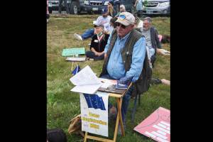 Ken Landfield staffs a voter registration table on Saturday, July 9, 2022, during the "Bans off our bodies" march and protest at WKFL Park in Homer, Alaska. (Photo by Michael Armstrong/Homer News)