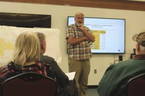 Robert Ruffner fields questions from attendees at a meeting to discuss the potential boundaries of a Nikiski Advisory Planning Commission at the Nikiski Community Recreation Center on Tuesday, July 19, 2022, in Nikiski, Alaska. (Ashlyn OHara/Peninsula Clarion)