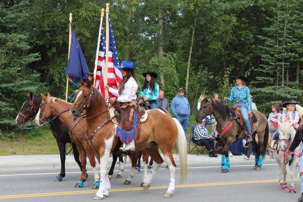 Riders with Alaska C&C Horse Adventures participate in the 65th annual Soldotna Progress Days Parade on Saturday, July 23, 2022, in Soldotna, Alaska. (Ashlyn OHara/Peninsula Clarion)