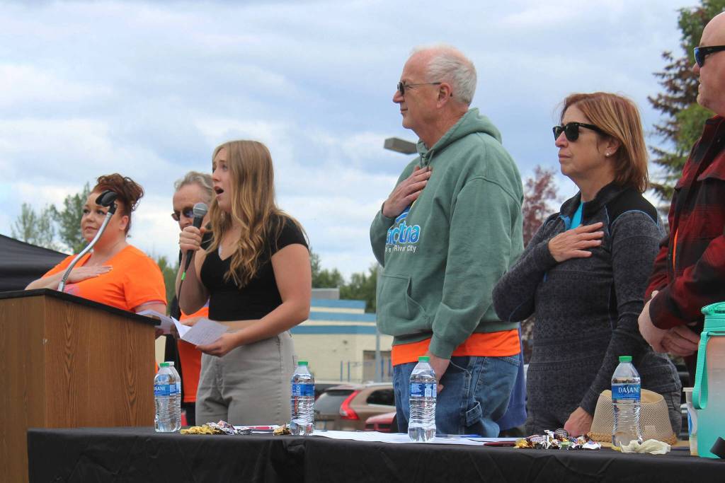 Katie Delker performs the U.S. National Anthem during the 2022 Soldotna Progress Day Parade on Saturday, July 23, 2022, in Soldotna, Alaska. (Ashlyn OHara/Peninsula Clarion)