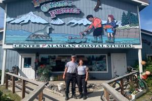 Emily Matthews and Andy Kowalczyk pose outside the Center for Alaskan Coastal Studies headquarters on Friday, July 29, 2022, in Homer, Alaska. (Photo by Charlie Menke/Homer News)