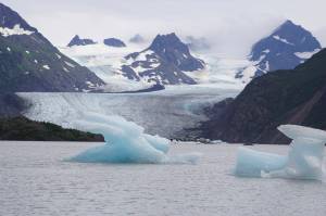 Icebergs have been pushed close to shore at Grewingk Glacier Lake on Monday, July 25, 2022, in Kachemak Bay State Park near Halibut Cove, Alaska. (Photo by Michael Armstrong/Homer News)