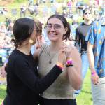 People gather in Ninilchik, Alaska, on Friday, Aug. 5, 2022, for Salmonfest, an annual event that raises awareness about salmon-related causes. (Camille Botello/Peninsula Clarion)