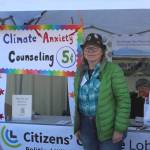 Sarah McCabe, of the Anchorage chapter of the Citizens Climate Lobby, speaks about climate change at Salmonfest in Ninilchik, Alaska, on Friday, Aug. 5, 2022. (Ashlyn OHara/Peninsula Clarion)