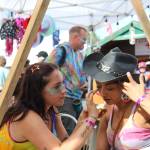 Attendees enjoy face-painting at Salmonfest in Ninilchik, Alaska, on Friday, Aug. 5, 2022. (Camille Botello/Peninsula Clarion)