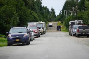 Vehicles are parked in or near the road on Thursday, Aug. 4, 2022, on Lakeshore Drive in Homer, Alaska. An ordinance passed by the Homer City Council on Monday, Aug. 8, 2022, made it unlawful to push snow into roads and city right-of-ways and to park vehices or leave other objects that interfere with snow removal or road maintenance  in city roads, paths, sidewalks or drainage ways or structures. (Photo by Michael Armstrong/Homer News)
