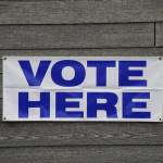 A banner at Homer City Hall identifies the building as a voting precinct. Early voting runs at city hall from 8 a.m. to 5 p.m. today, Friday and Monday in Homer, Alaska. (Photo by Michael Armstrong/Homer News)