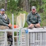 Ken Gates (left) and Jim Boersma at the Funny River weir in Kenai National Wildlife Refuge, Alaska. (Photo by Katrina Liebich/USFWS)