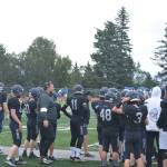 Mariners wait in anticipation for the first kick-off of the season on Saturday, Aug. 13, 2022, at Homer High School in Homer, Alaska. (Photo by Charlie Menke/ Homer News)