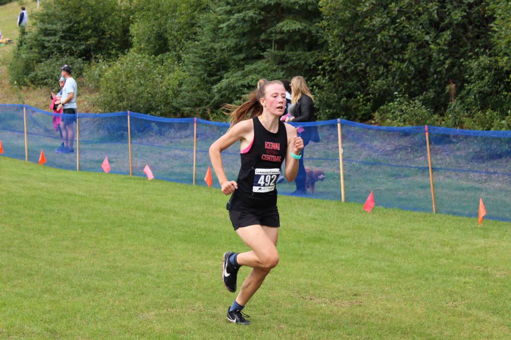 Kenai Central High Schools Jayna Boonstra runs toward the finish line at the 2022 Ted McKenney XC Running Invitational at Skyview Middle School on Saturday, Aug. 20, 2022 in Soldotna, Alaska. (Ashlyn OHara/Peninsula Clarion)