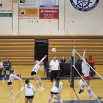 Senior Isabel Dye strikes with vigor at Homer High School Alice Witte Gym on Wednesday, Aug. 24, 2022. (Photo by Charlie Menke/ Homer News)