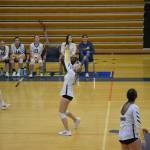 Isabel Dye with an important dig at Homer High School Alice Witte Gym on Wednesday, Aug. 24, 2022. (Photo by Charlie Menke/ Homer News)