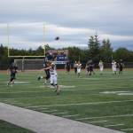 Senior Morgan Techie rises high to catch a 37-yard throw on Friday, Aug. 26 at Homer High School Field in Homer, Alaska. (Photo by Charlie Menke/Homer News)