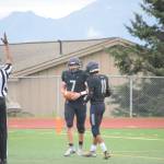 Carter Tennison and Morgan Techie celebrate a touchdown on Friday, Aug. 26 at Homer High School Field in Homer, Alaska. (Photo by Charlie Menke/Homer News)