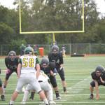 Sophomore Preston Stanislaw leads the offensive line on Friday, Aug. 26 at Homer High School Field in Homer, Alaska. (Photo by Charlie Menke/Homer News)