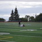 Junior Chris Martishev escapes defensive pressure on Friday, Aug. 26 at Homer High School Field in Homer, Alaska. (Photo by Charlie Menke/Homer News)