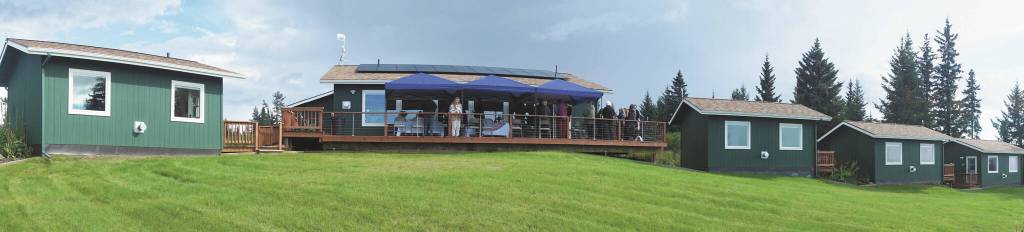 Photos by Michael Armstrong/Homer News
Visitors gather on the deck of Eva, the main house of the Storyknife Writers Retreat, on Monday, Aug. 29, for an open house. The six writers cabins are on either side of Eva, named after the poet Eva Saulitis.