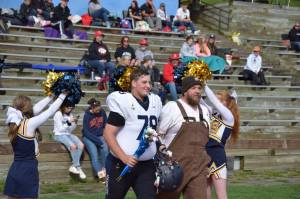 Senior Charles Van Meter walks out for Senior Night on Saturday, Sep. 3, at the Homer High School Field in Homer, Alaska. (Photo by Charlie Menke/ Homer News)