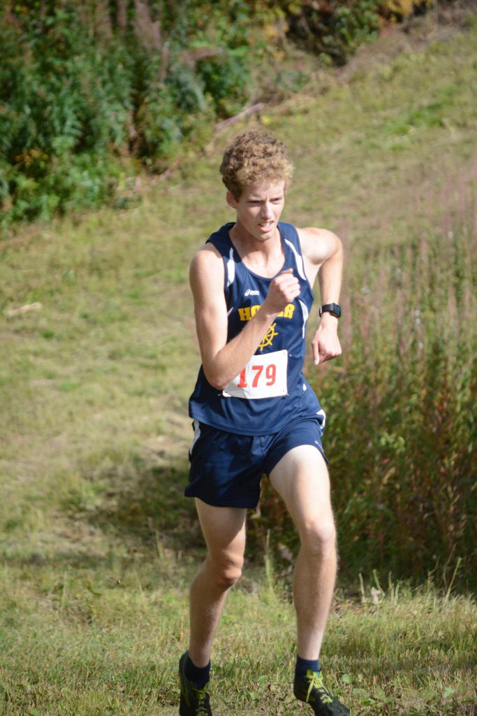 Homers Seamus McDonough flies down the last hill on his way to winning the Homer Invite on Friday, Sept. 2, 2022, at the Lookout Mountain Trails near Homer, Alaska. (Photo by Michael Armstrong/Homer News)
