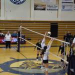 Junior Goldie Hill blocks the Nikiski try on Saturday, Sept. 10, at Homer High School Gym. (Photo by Charlie Menke/ Homer News)