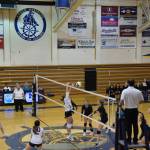 Hill with a block on Saturday, Sept. 10, at Homer High School Gym. (Photo by Charlie Menke/ Homer News)
